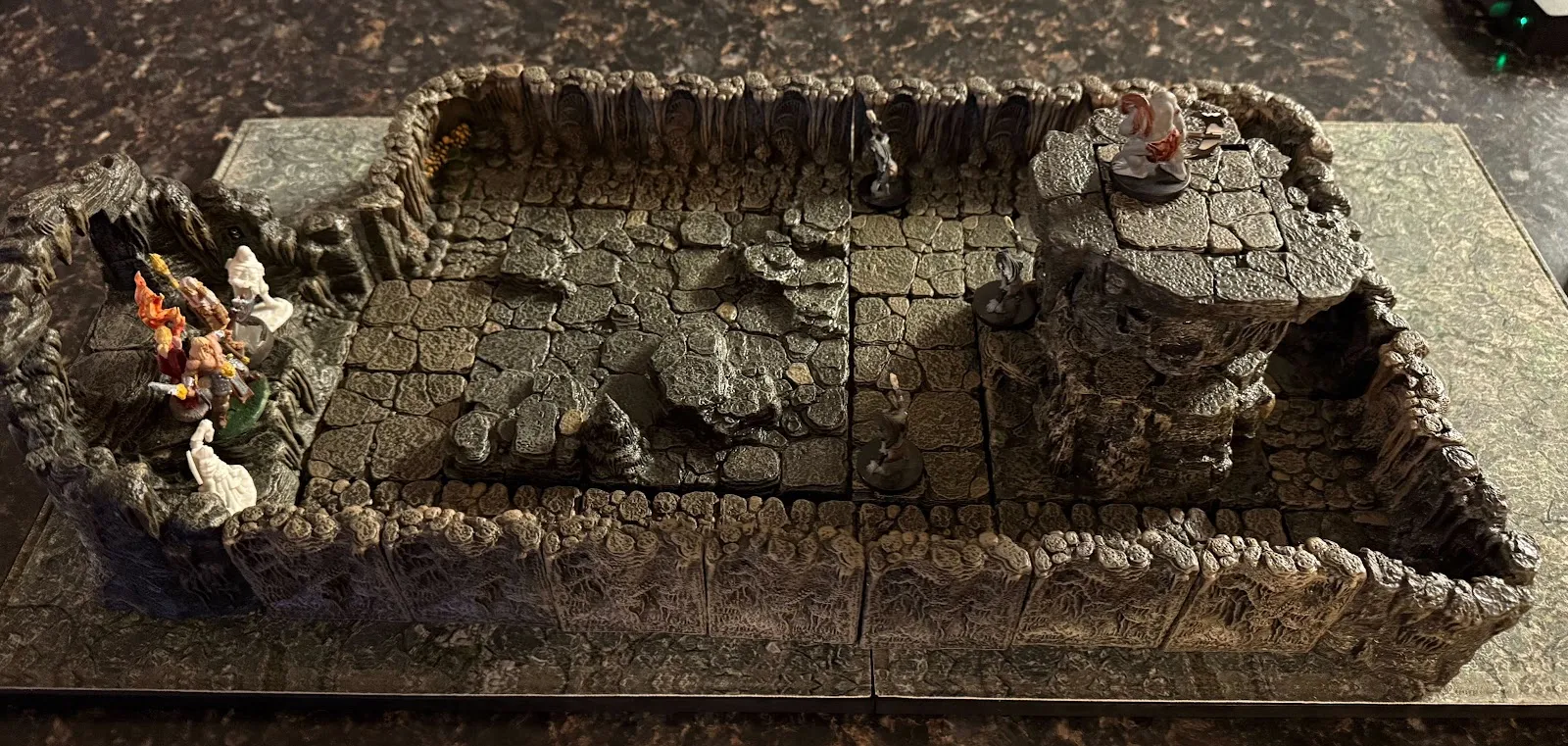 Photo of a painted Dwarven Forge Stairway to Violence terrain set with grimlock miniatures