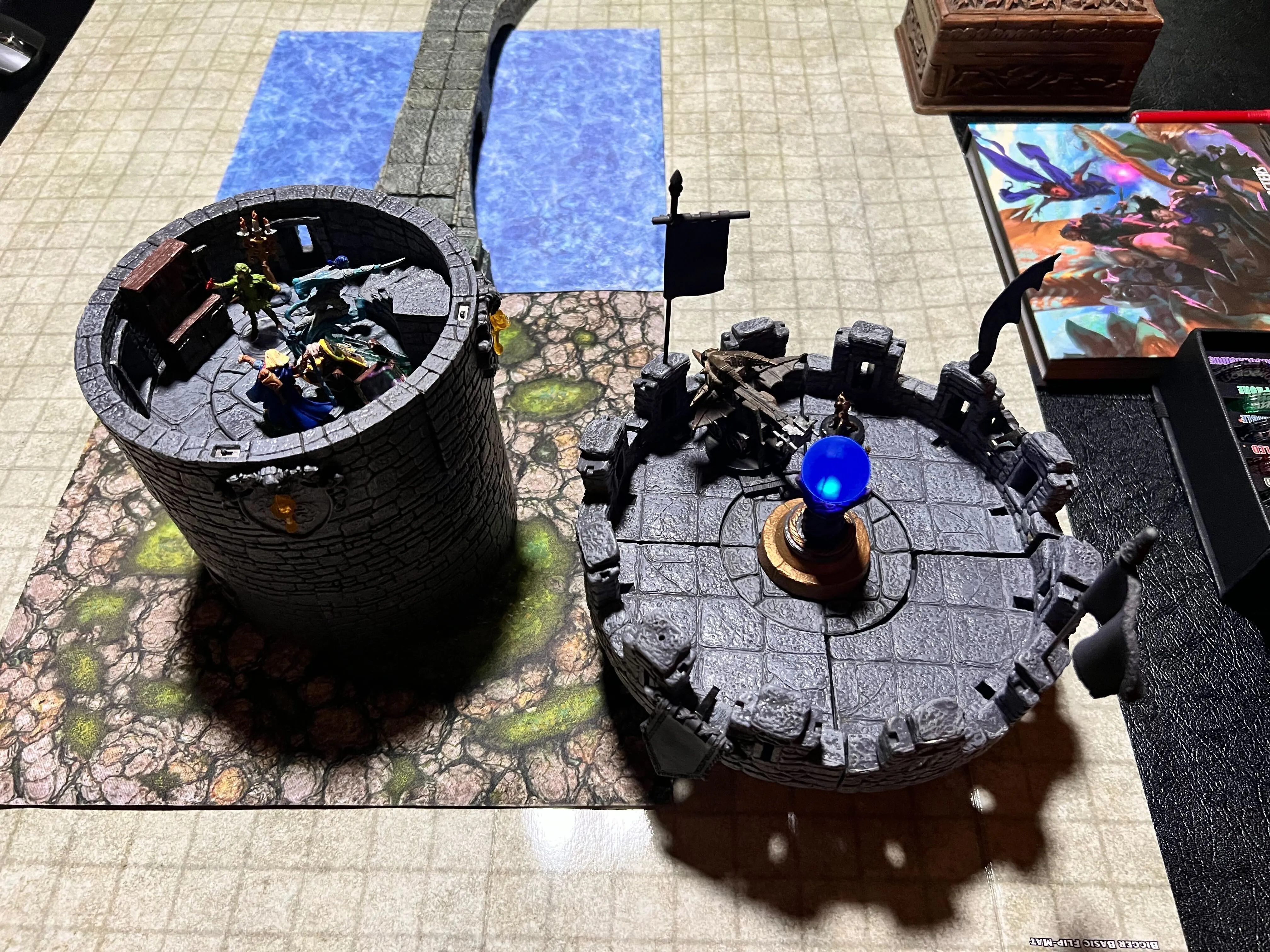 Battle in Progress! A picture of a miniatures in a tower in the middle of a dnd battle